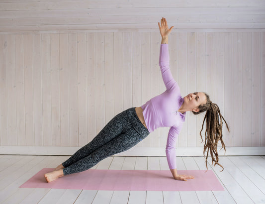 Image of a woman joyfully engaged in a fun exercise routine, showcasing the excitement and enjoyment of fitness.