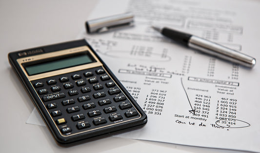 Budgeting tools and calculator on a desk